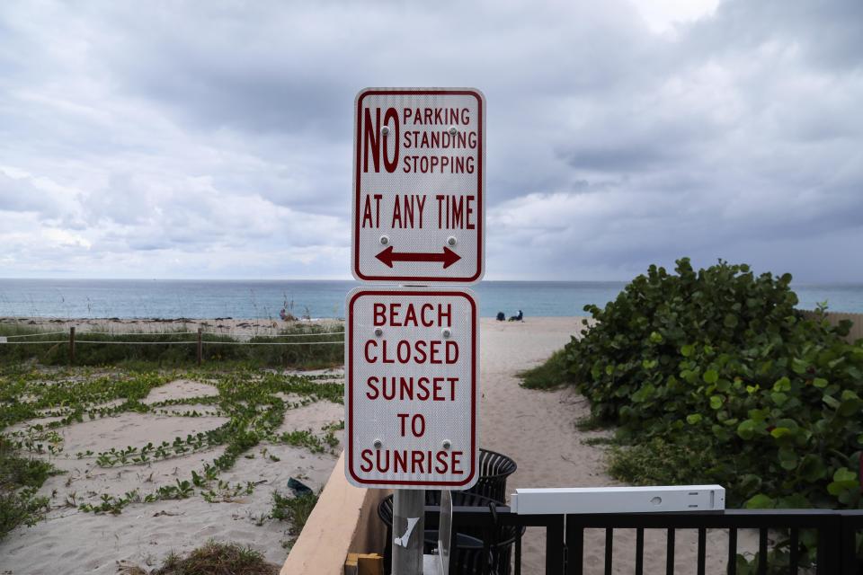 A sign at the intersection of Root Trail and North Ocean Boulevard Thursday says the beach is closed from sunset to sunrise.