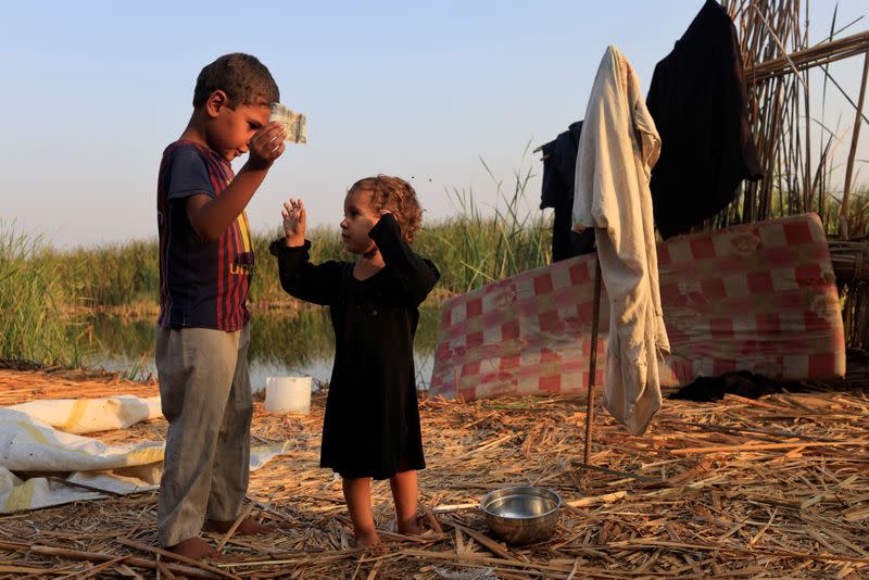 The Wider Image: "Our whole life depends on water" climate change, pollution and dams threaten Iraq's Marsh Arabs