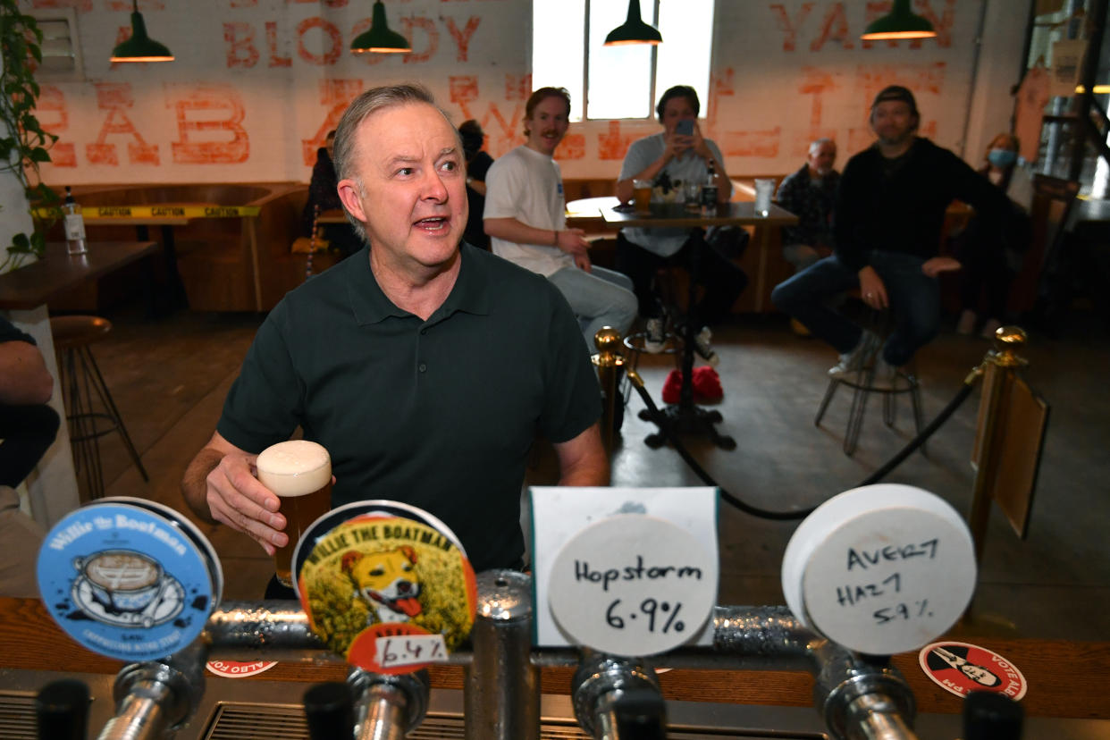 Federal Opposition Leader Anthony Albanese drinks a beer during the reopening of Willie the Boatman craft brewery in St Peters, Sydney, Monday, October 11, 2021
