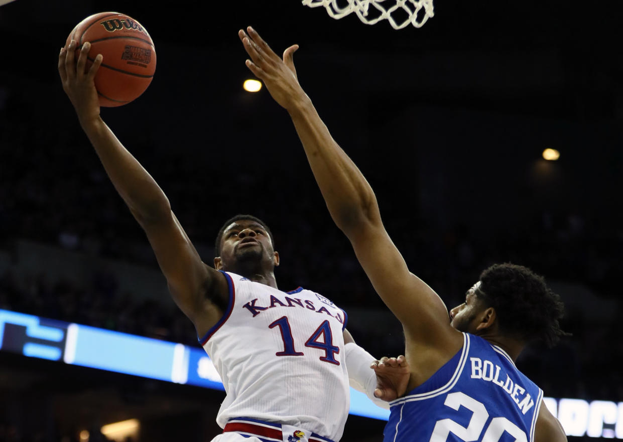 Malik Newman drives to the basket against Duke in the Elite Eight. (Getty)
