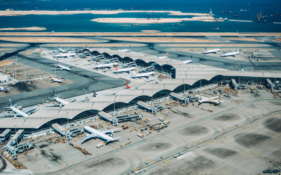 Aerial view of Hong Kong International Airport with planes parking on the tarmac
