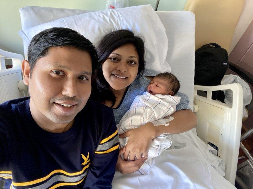 Nabil Haque and Sungida Rashid with their newborn daughter at Boston's St. Elizabeth's Medical Center in October 2023. / Credit: Courtesy of Nabil Haque