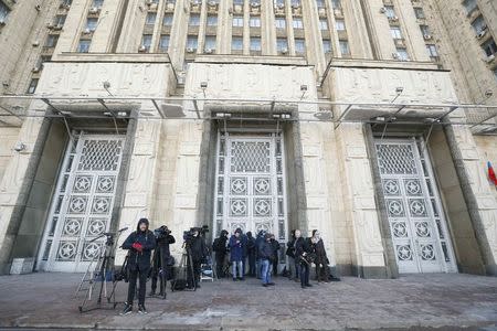 Journalists wait for the British Ambassador to Russia Laurie Bristow at the Russian Foreign Ministry in Moscow, Russia, March 17, 2018. REUTERS/David Mdzinarishvili