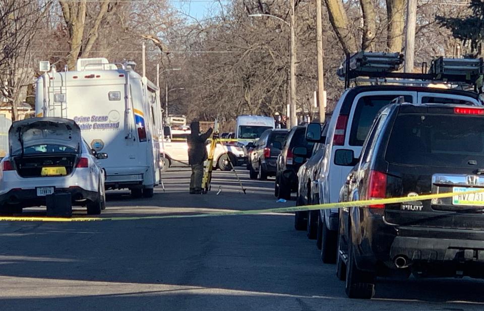 Police investigate the scene where a juvenile male was killed in the 1400 block of 17th Street in the early morning hours of Jan. 1, 2020.