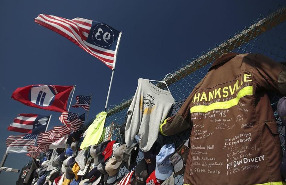 <p>Photo by Jeff Swensen/Getty Images</p><p>Over 25,000 items of memorabilia sit along the fence at the Flight 93 Memorial site.</p>