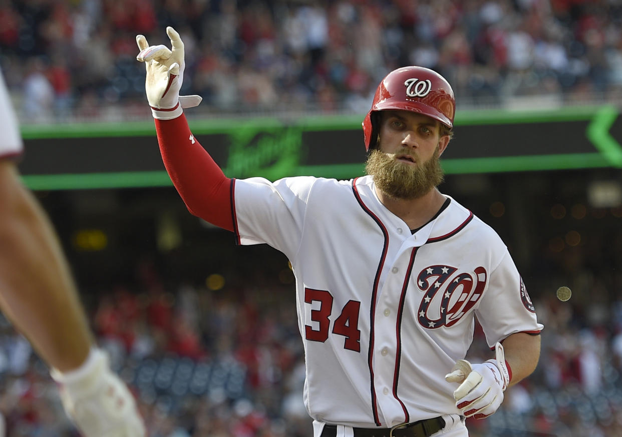 Bryce Harper will earn a $21.65M salary in 2018 before he becomes a free agent. (AP)