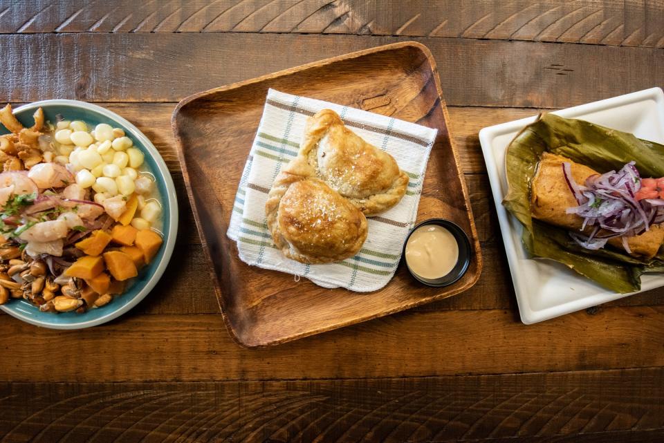 From left, ceviche carretillero, empanadas and Peruvian tamal are among the many street food items served at Latin Pot in Dublin.