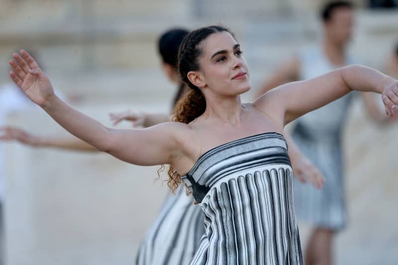 Greek actresses playing the role of priestesses perform during the Olympic Flame handover ceremony, at the Panathenaic Stadium in Athens. Aristidis Vafeiadakis/ZUMA Press Wire/dpa