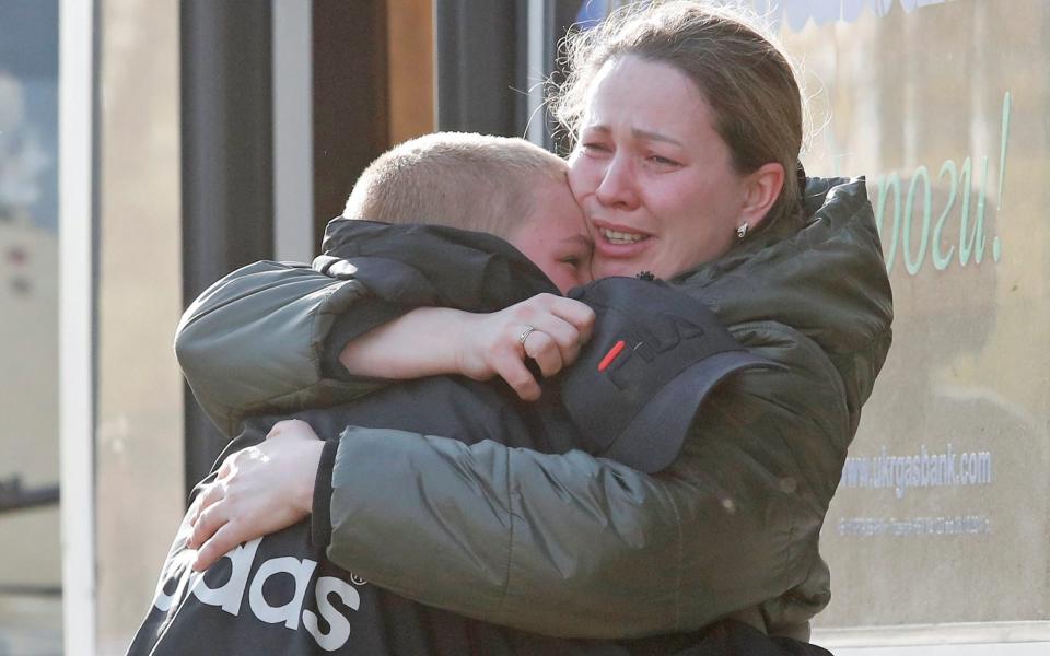 Azovstal steel plant employee Valeria hugs her son Matvey after being evacuated from Mariupol, as they meet at a temporary accommodation centre in the village of Bezimenne in the Donetsk Region, Ukraine on May 1, 2022.  - Alexander Ermochenko/Reuters