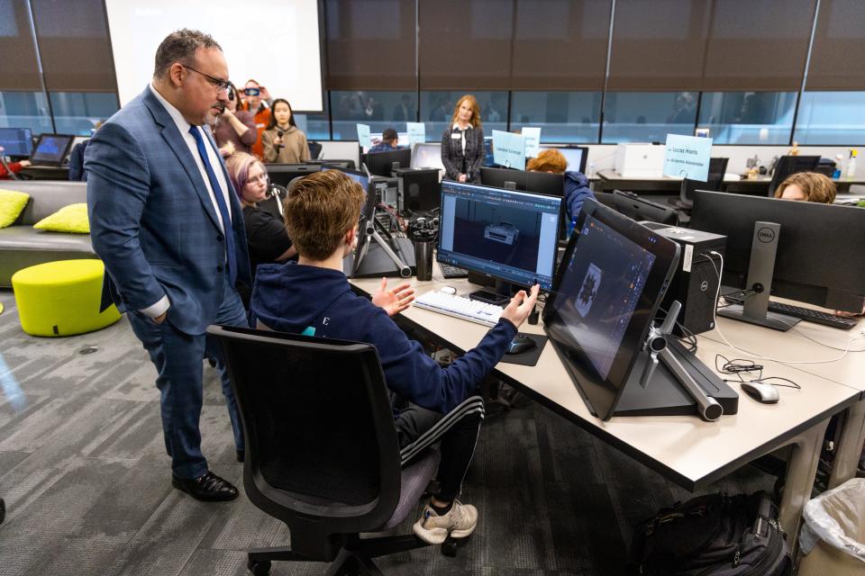 U.S. Secretary of Education Miguel Cardona observes a classroom during his visit Thursday to the Francis Tuttle Technology Center Rockwell Campus.