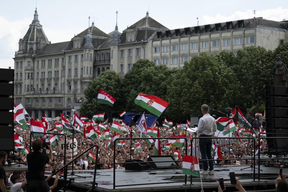 Péter Magyar, a rising challenger to Hungarian Prime Minister Viktor Orbán, addresses people at a campaign rally in the rural city of Debrecen, Hungary, on Sunday, May 5, 2024. Magyar, whose TISZA party is running in European Union elections, has managed to mobilize large crowds of supporters on a campaign tour of Hungary's heartland, a rarity for an Orbán opponent. (AP Photo/Denes Erdos)