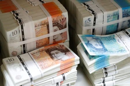 Pound touches day’s highs on strong wage growth figures