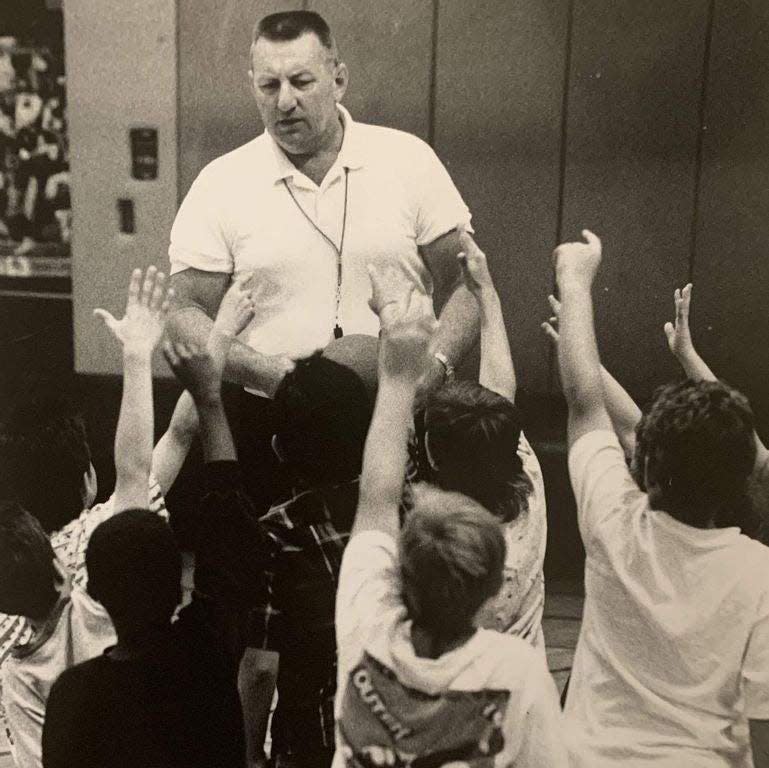 Sherman Memmelaar oversees a gym class at Meadow Hill School in Newburgh in 1990.