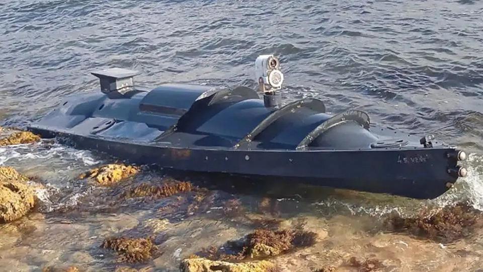 The mysterious unmanned surface vessel that washed ashore in Crimea in early September. At the time, <em>The War Zone's </em>analysis stated the very low profile jet-ski engine-powered unmanned boat was a weaponized 'suicide drone' setup for impact detonation.