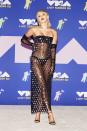 <p>Miley Cyrus shimmered in a diaphanous strapless Mugler dress and matching elbow-length gloves.</p>