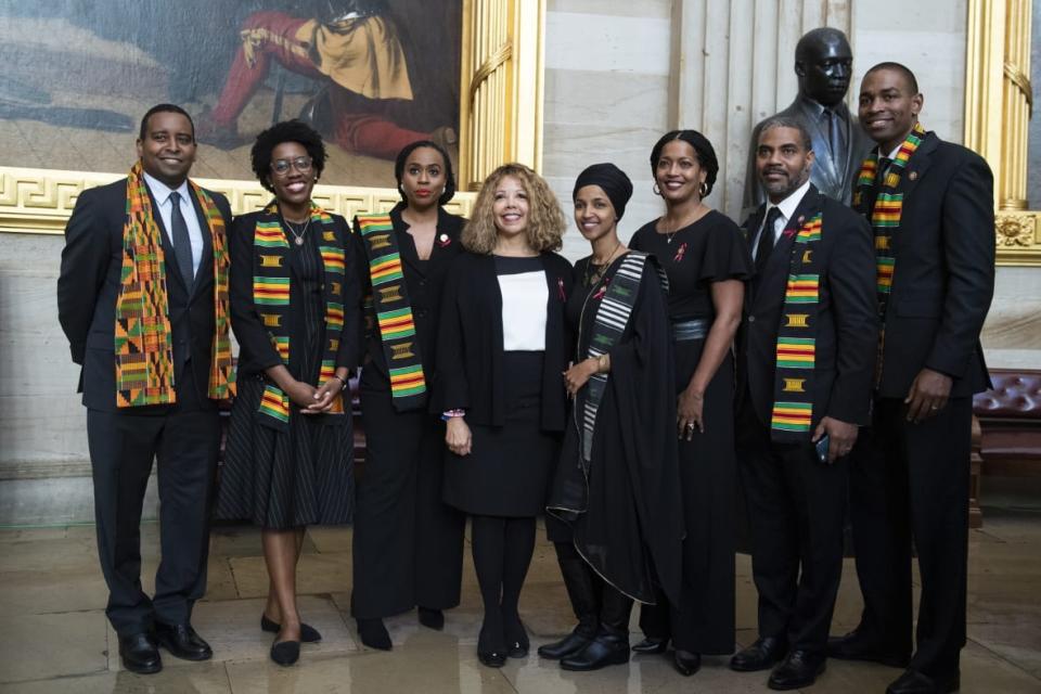 From left, Reps. Joe Neguse, D-Colo., Lauren Underwood, D-Ill., Ayanna Pressley, D-Mass., Lucy McBath, D-Ga., Ilhan Omar, D-Minn., Jahana Hayes, D-Conn., Steven Horsford, D-Nev., and Antonio Delgado, D-N.Y., pose near the statue of Dr. Martin Luther King, Jr., in the Capitol Rotunda before a memorial service for the late Rep. Elijah Cummings, D-Md., in Statuary Hall on Thursday, October 24, 2019. (Photo By Tom Williams/CQ-Roll Call, Inc via Getty Images),