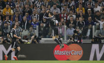 Real Madrid's Cristiano Ronaldo celebrates after scoring their first goal with James Rodriguez Reuters / Max Rossi