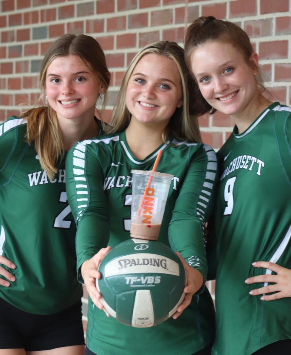 Wachusett volleyball captains (from left) Rose O’Malley, Allie Johnson and Logan Baker, along with the battery that keeps the Mountaineers running.