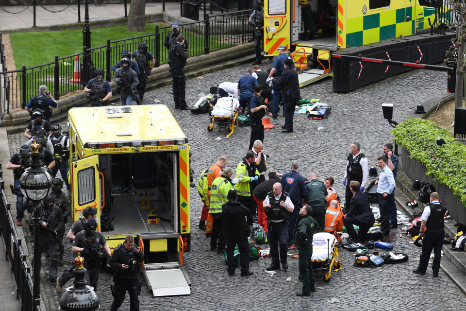 Emergency services at the Palace of Westminster at the scene where PC Keith Palmer was attacked (PA)