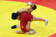 Jenny Fransson (red) of Sweden competes against Wang Jiao (blue) of China in Women's FR 72 kg 1/8 Final held at the China Agriculture University Gymnasium on Day 9 of the Beijing 2008 Olympic Games on August 17, 2008 in Beijing, China. (Phil Walter/Getty Images)