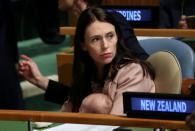 New Zealand Prime Minister Jacinda Ardern holds her baby Neve in the General Assembly Hall at the Nelson Mandela Peace Summit during the 73rd United Nations General Assembly in New York, U.S., September 24, 2018. REUTERS/Carlo Allegri