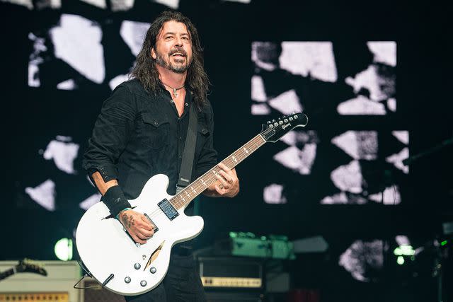 <p>Erika Goldring/Getty</p> Dave Grohl performs at Bonnaroo in June 2023