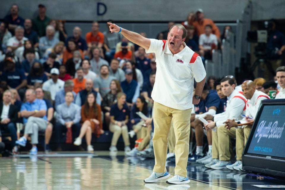 Ole Miss Rebels head coach Kermit Davis talks with his team from the sideline as Auburn Tigers take on Ole Miss Rebels at Neville Arena in Auburn, Ala., on Wednesday, Feb. 22, 2023.