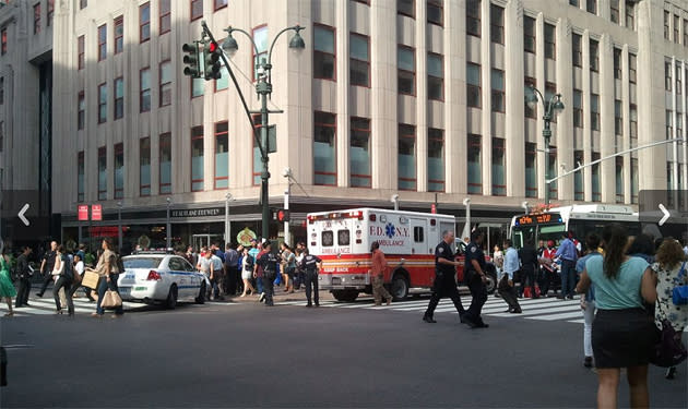 Police and EMS were on the scene after a gunman opened fire outside of the Empire State Building in New York City. Twitter photo courtesy of Robby Cortes (@RobbyCortes)