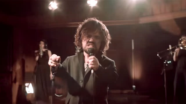 Peter Dinklage has a since humor about his <em>Game of Thrones</em> co-stars dropping like flies each season. Dinklage joined forces with Coldplay to put together a <em> Game of Thrones</em> musical in honor of Red Nose Day, which uses humor and celebrities to help raise money for young people living in poverty. In a new video shared by the band, Dinklage -- who won an Emmy for his performance as fan favorite Tyrion Lannister on the HBO series -- is seen singing about the show's numerous deaths. <strong> PHOTOS: <em>Game of Thrones </em>Cast -- On Screen vs. Real Life </strong> "Still going strong," Dinklage croons. "Remember Ned Stark? He was a lot of fun, but he didn't make it past season one. "Robert Baratheon was part of that crew," the song continues, "but he never made it to season two." Calling out the "Red Wedding" death of Ned Stark's son, Robb Stark, Dinklage sings, "The King of the North was cool you says. Another favorite that ended up dead." <strong> NEWS: Has <em>Game of Thrones</em> Finally Gone Too Far? Episode Leads to Online Outrage </strong> HBO This music video isn't the only connection Coldplay has to the acclaimed show. In season three, the band's drummer, Will Champion, made a small cameo during the wedding feast at the home of Walder Frey (a.k.a. the Red Wedding).