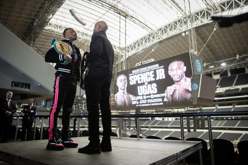 Errol Spence Jr. and Yordenis Ugas pose together at Jerry's World.