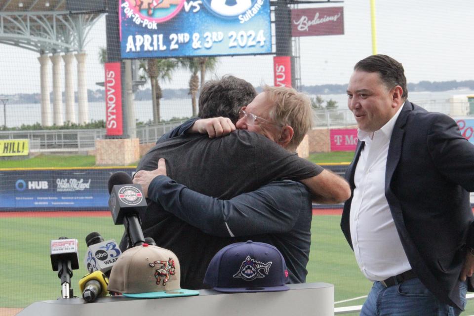 Pensacola native Bubba Watson (left) and Pensacola Blue Wahoos Owner Quint Studer hug each other during a press conference announcing a special series between the Blue Wahoos and Sultanes de Monterrey on Thursday, Nov. 16, 2023.