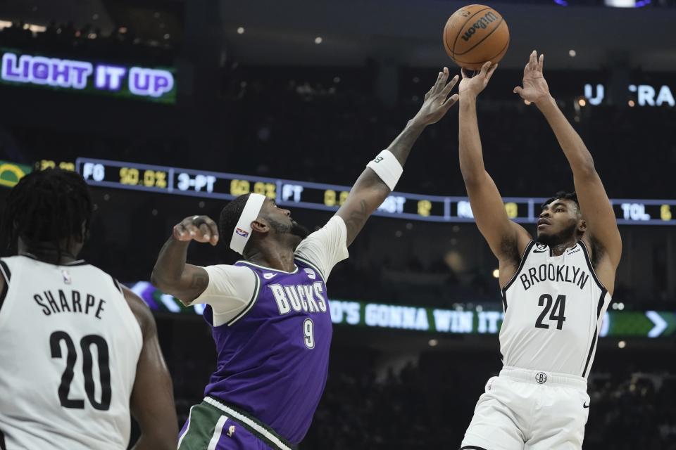 Brooklyn Nets' Cam Thomas shoots over Milwaukee Bucks' Bobby Portis during the first half of an NBA basketball game Thursday, March 9, 2023, in Milwaukee. (AP Photo/Morry Gash)