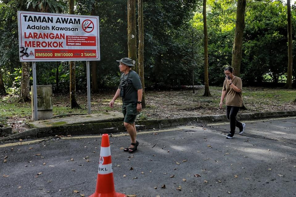 People jog at Taman Rimba Kiara in Kuala Lumpur during the CMCO period October 19, 2020. — Pictures by Ahmad Zamzahuri