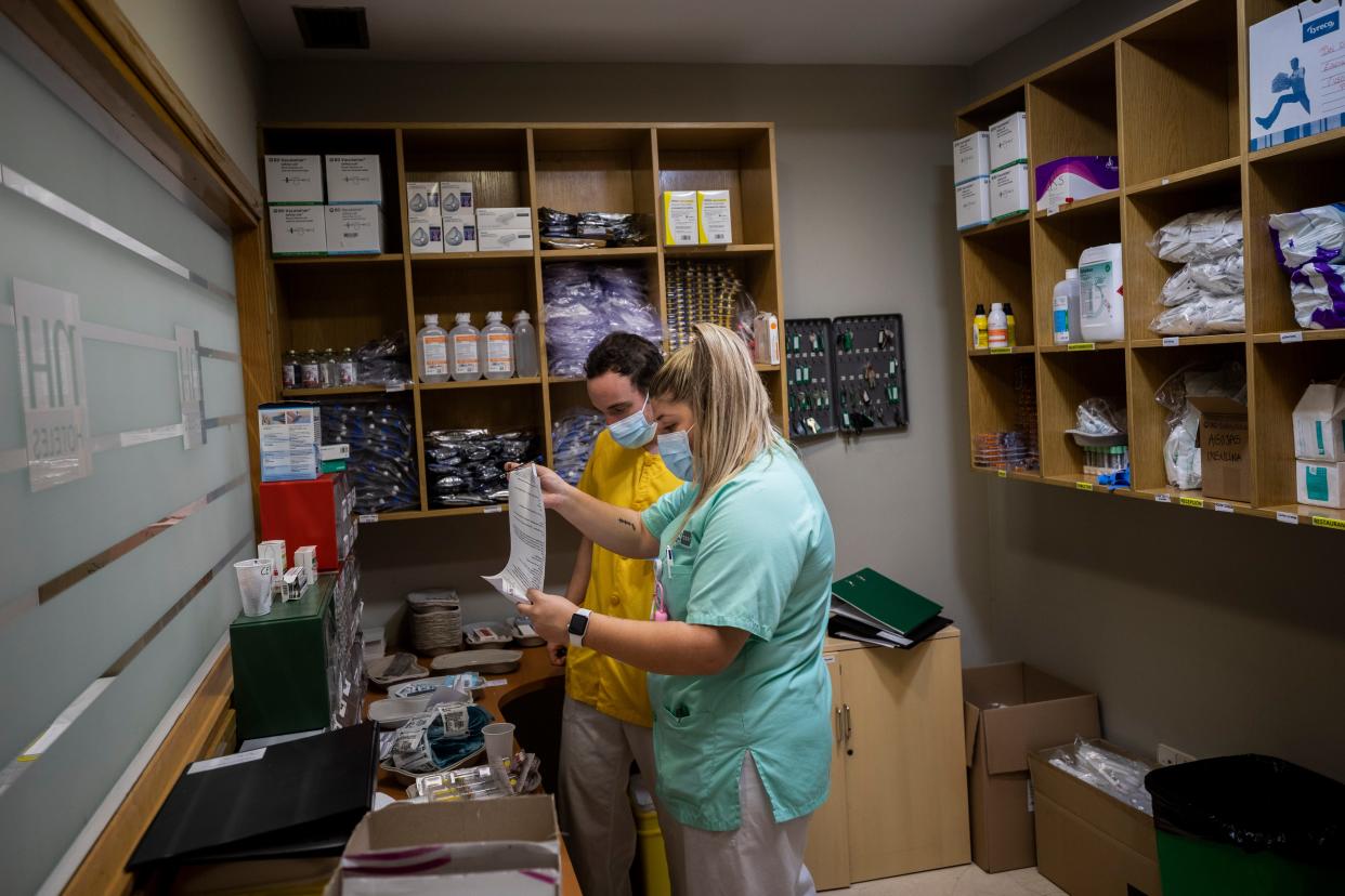 Nurse Paula Gonzalez works for COVID-19 patients under quarantine in Leganes, outskirts of Madrid, Spain on Thursday, Oct. 15, 2020.