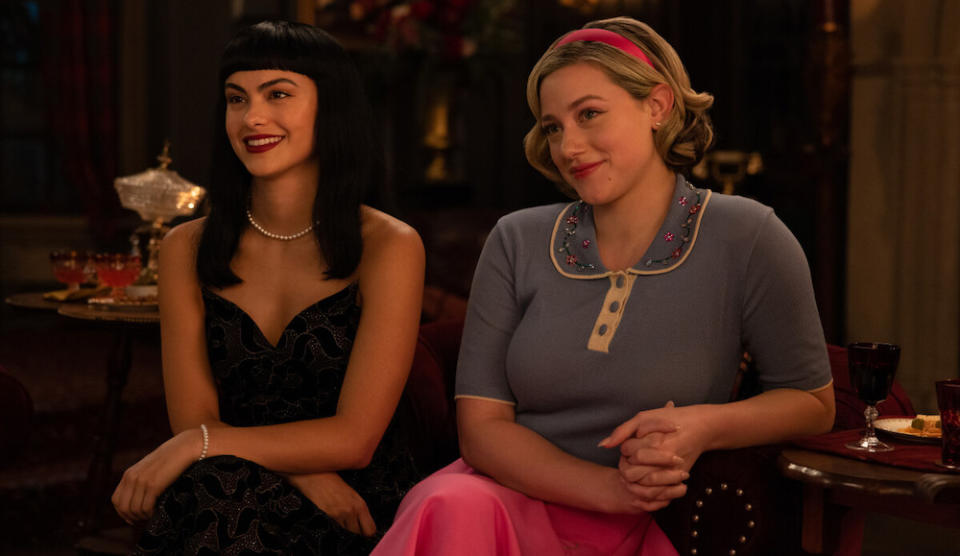 Riverdale -- “Chapter One Hundred Thirty-Seven: Goodbye, Riverdale” -- Image Number: RVD720d_0190r -- Pictured (L - R): Camila Mendes as Veronica Lodge and Lili Reinhart as Betty Cooper -- Photo: Justine Yeung/The CW -- © 2023 The CW Network, LLC. All Rights Reserved.