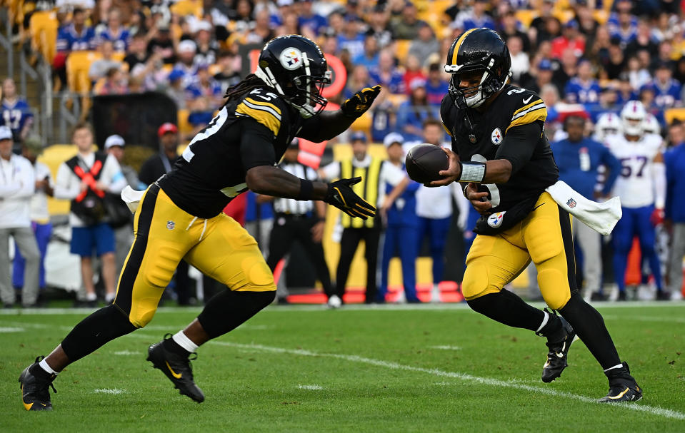 PITTSBURGH, PENNSYLVANIA - AUGUST 17: Russell Wilson #3 of the Pittsburgh Steelers hands the ball off to Najee Harris #22 in the first quarter during the preseason game against the Buffalo Bills at Acrisure Stadium on August 17, 2024 in Pittsburgh, Pennsylvania. (Photo by Justin Berl/Getty Images)