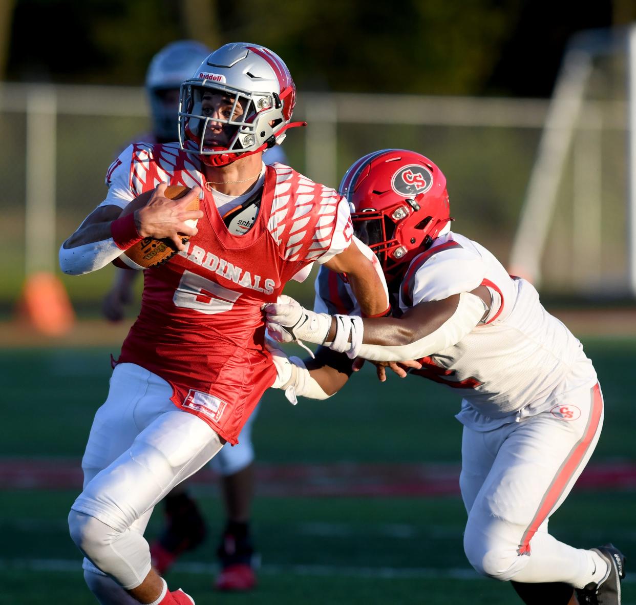 Sandy Valley quarterback Nick Petro runs for a first down against Canton South in the first half at Sandy Valley.  Friday, Sept. 01, 2023.