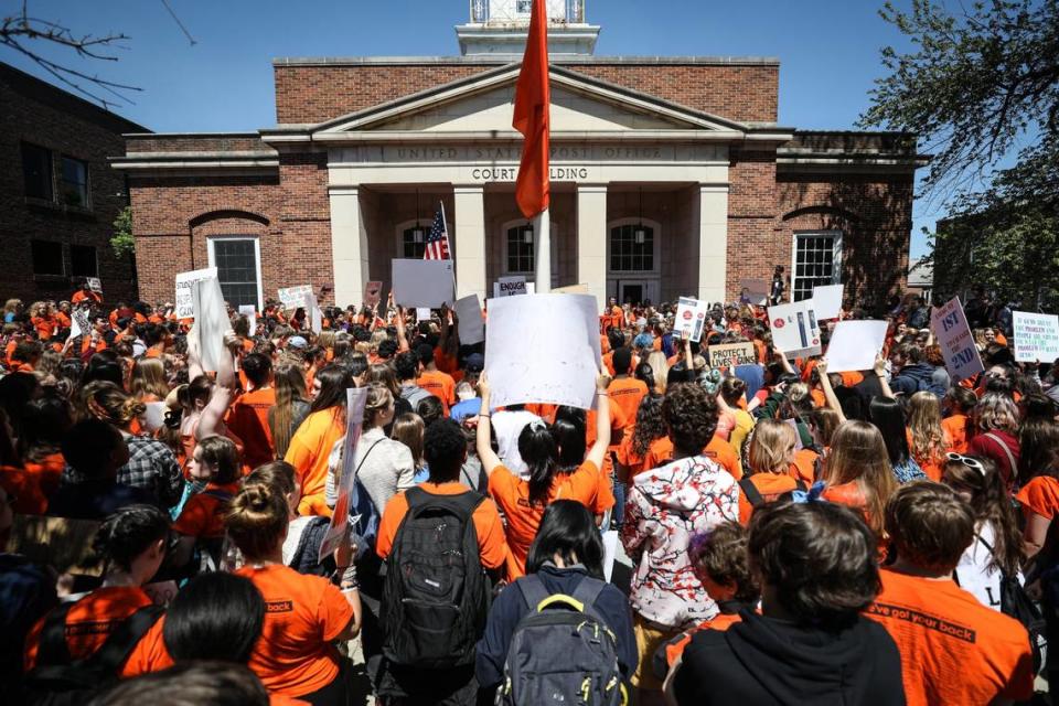 Hundreds of students from Chapel Hill and Carrboro City Schools, along with parents and community members, gathered at Peace and Justice Plaza on Franklin St. on April 20, 2018, the 19th anniversary of the Columbine school shooting.