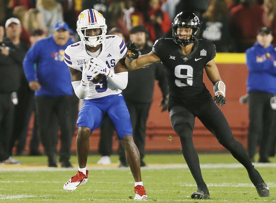 Kansas Jayhawks cornerback Mello Dotson(3) intercepts a pass intended to Iowa State Cyclones wide receiver Jayden Higgins (9) during the first quarter at Jack Trice Stadium on Saturday, Nov. 4, 2023, in Ames, Iowa.