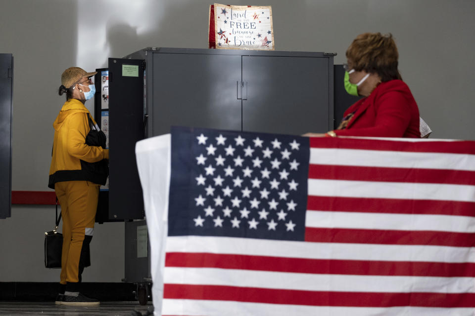 Voters in Atlanta cast their ballots on the first day of early voting