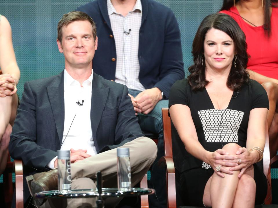 Peter Krause and Lauren Graham speak onstage during the "Parenthood" panel discussion at the NBC portion of the 2013 Summer Television Critics Association.