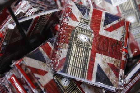 Union flags and the Big Ben clocktower cover notebooks are seen on sale in London, Britain, Thursday December 17, 2015. REUTERS/Luke MacGregor