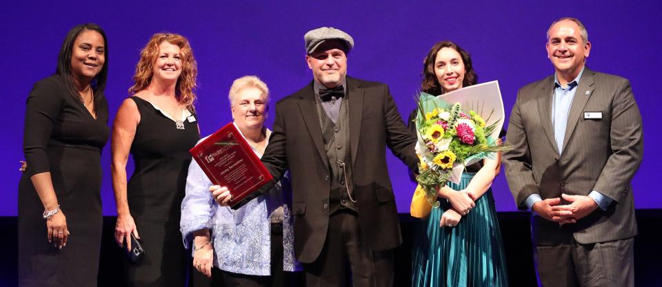 Flagler County Schools Superintendent LaShakia Moore and Flagler County School Board members Colleen Conklin, Cheryl Massaro, Christy Chong and Will Fury with 2023-2024 Employee of the Year Jimmy Sorrentino of Buddy Taylor Middle School, Wednesday, Jan. 24, 2024, during A Night of Legends at the Flagler Auditorium.