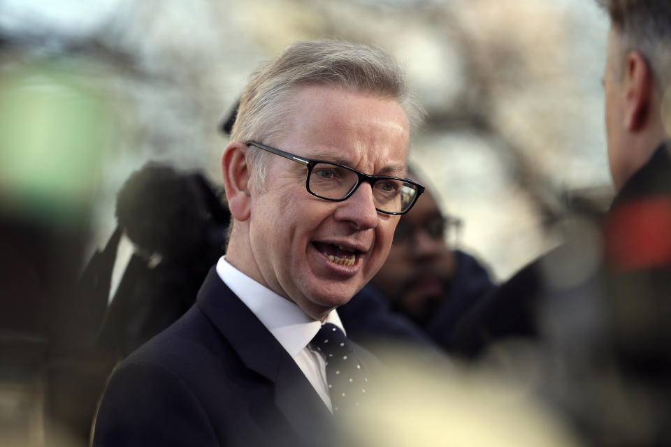 Britain's environment secretary Michael Gove speaks to the media outside the Houses of Parliament, in London, Wednesday December 12, 2018. British Conservative lawmakers forced a no-confidence vote in Prime Minister Theresa May for Wednesday, throwing U.K. politics deeper into crisis and Brexit further into doubt. (AP Photo/Tim Ireland)