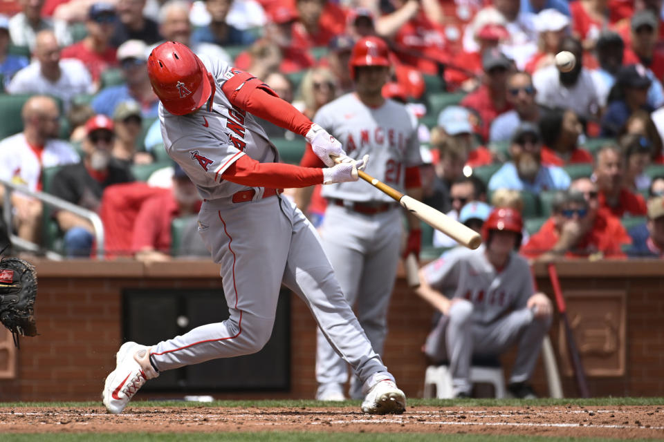 Los Angeles Angels' Taylor Ward hits a sacrifice fly RBI in the third inning of a baseball game against the St. Louis Cardinals on Thursday May 4, 2023, in St. Louis. (AP Photo/Joe Puetz)