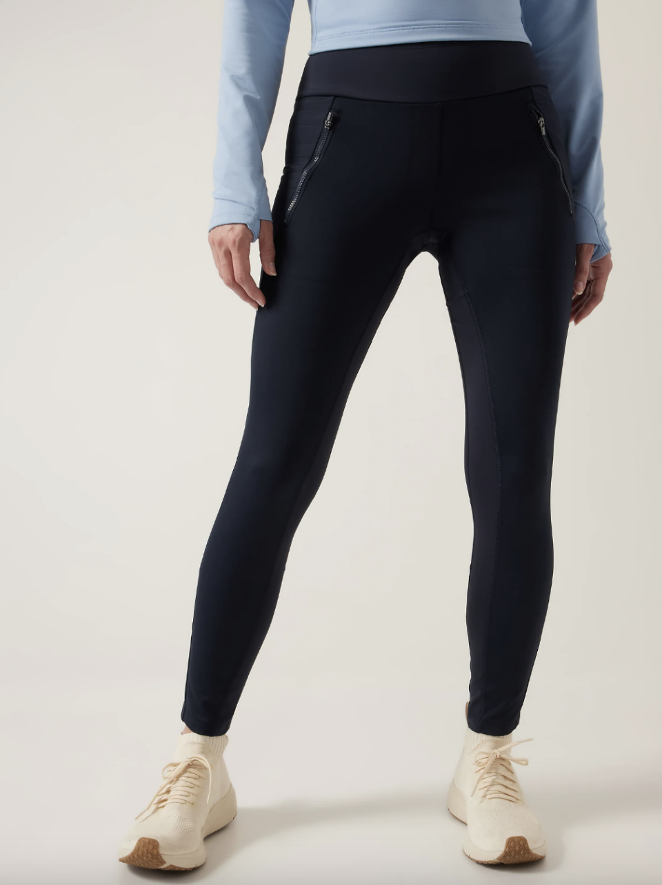 Peak Hybrid Fleece Tight in navy (Photo via Athleta)