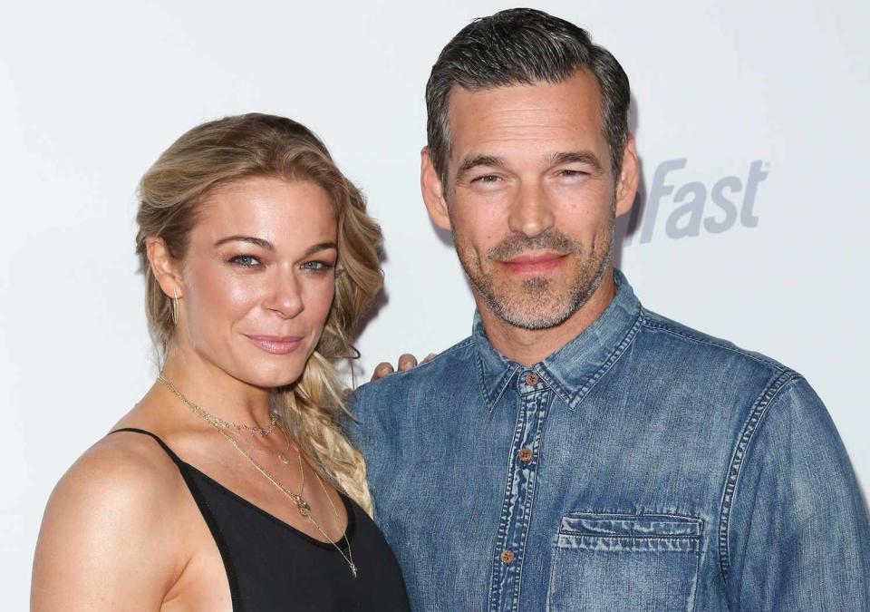 LeAnn Rimes (L) and Actor Eddie Cibrian (R) attend OK! Magazine's Summer kick-off party at The W Hollywood on May 17, 2017 in Hollywood, California