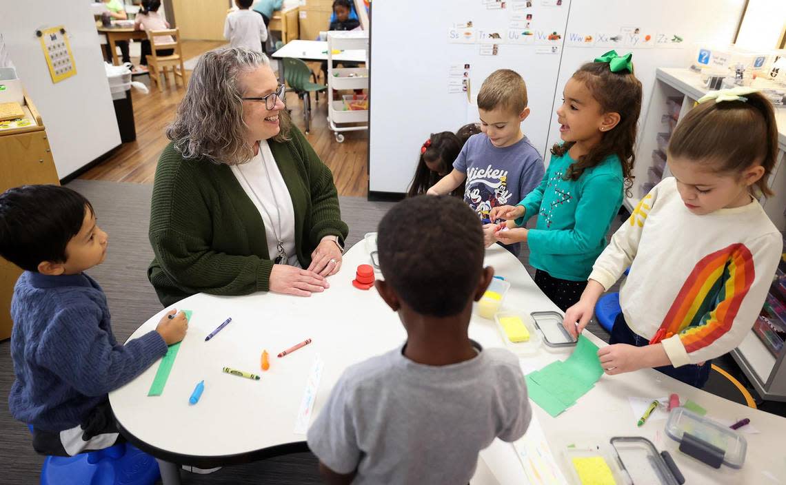 Berkshire Elementary pre-K teacher Casey DiBenedetto works with her students during class on Thursday, December 14, 2023. DiBenedetto says a pay raise would help be able to retire at an earlier date.