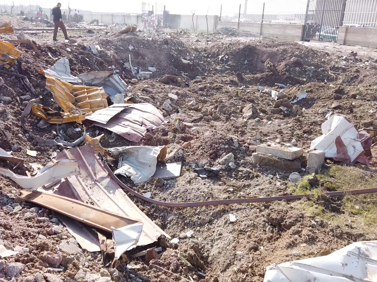 General view of the debris of the Ukraine International Airlines, flight PS752, Boeing 737-800 plane that crashed after take-off from Iran's Imam Khomeini airport, on the outskirts of Tehran, Iran January 8, 2020 is seen in this screen grab obtained from a social media video via REUTERS       