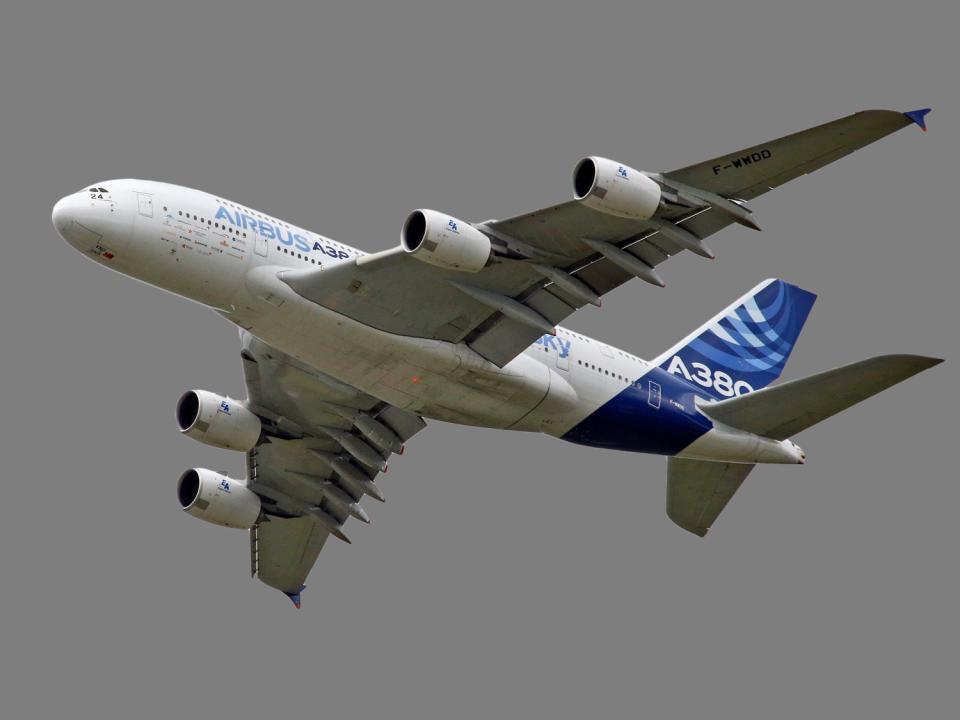 Airbus A380 jet in flight, graphic element on gray